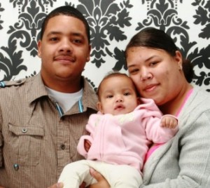 Tamara Johnson with her husband and baby