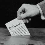 hand with ballot